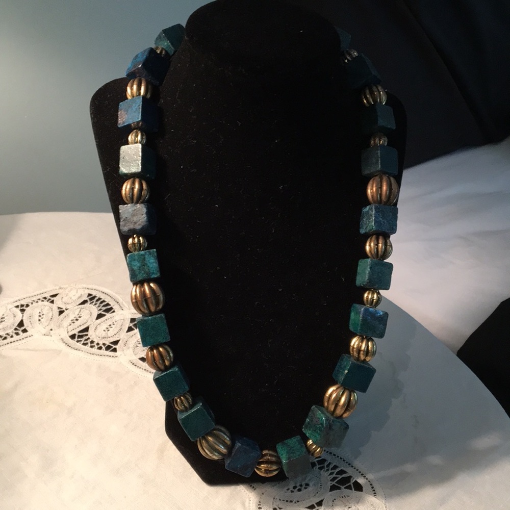 Gorgeous handcrafted marble and brass necklace.